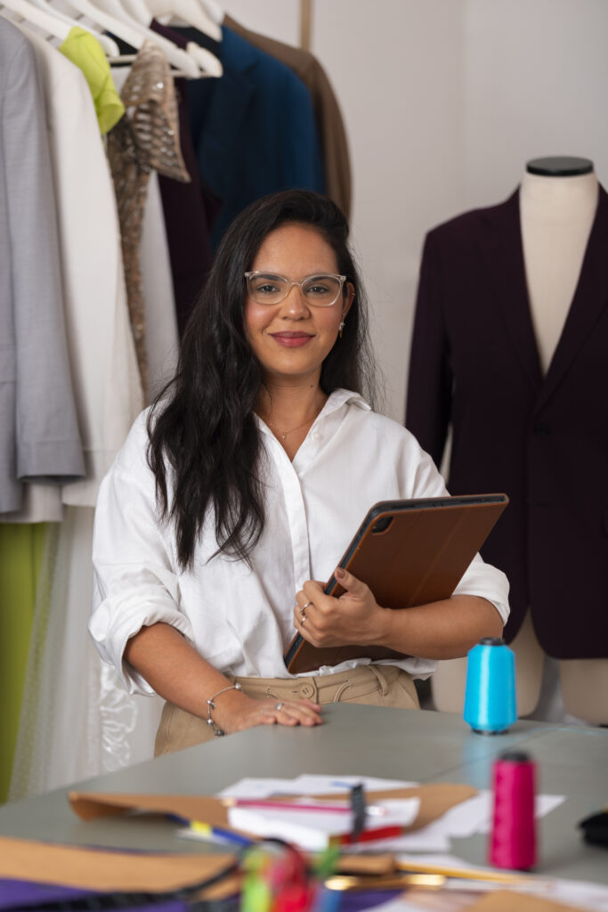 front view brazilian woman working as clothing designer front view brazilian woman working as clothing designer